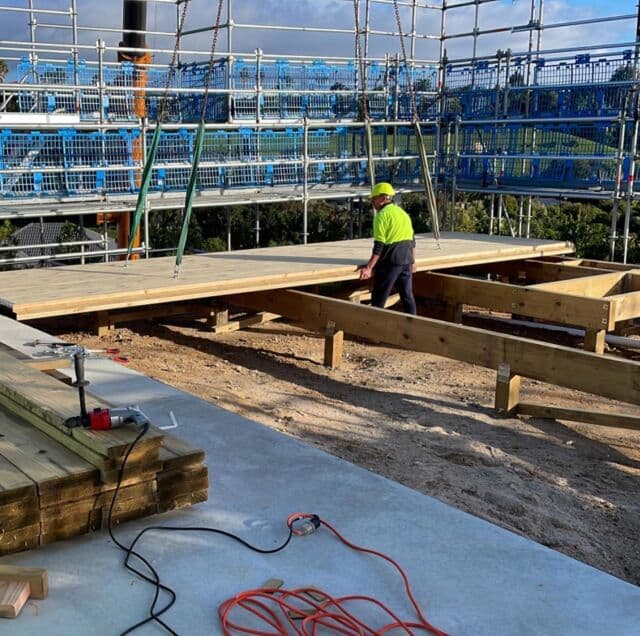 Woodtek crew installing a CLT subfloor
